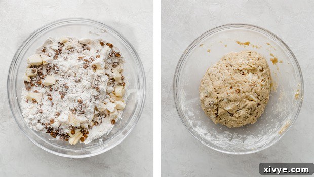 Warm Apple Cinnamon Scones 5 Apple cinnamon scones dough in a glass bowl, partially mixed.