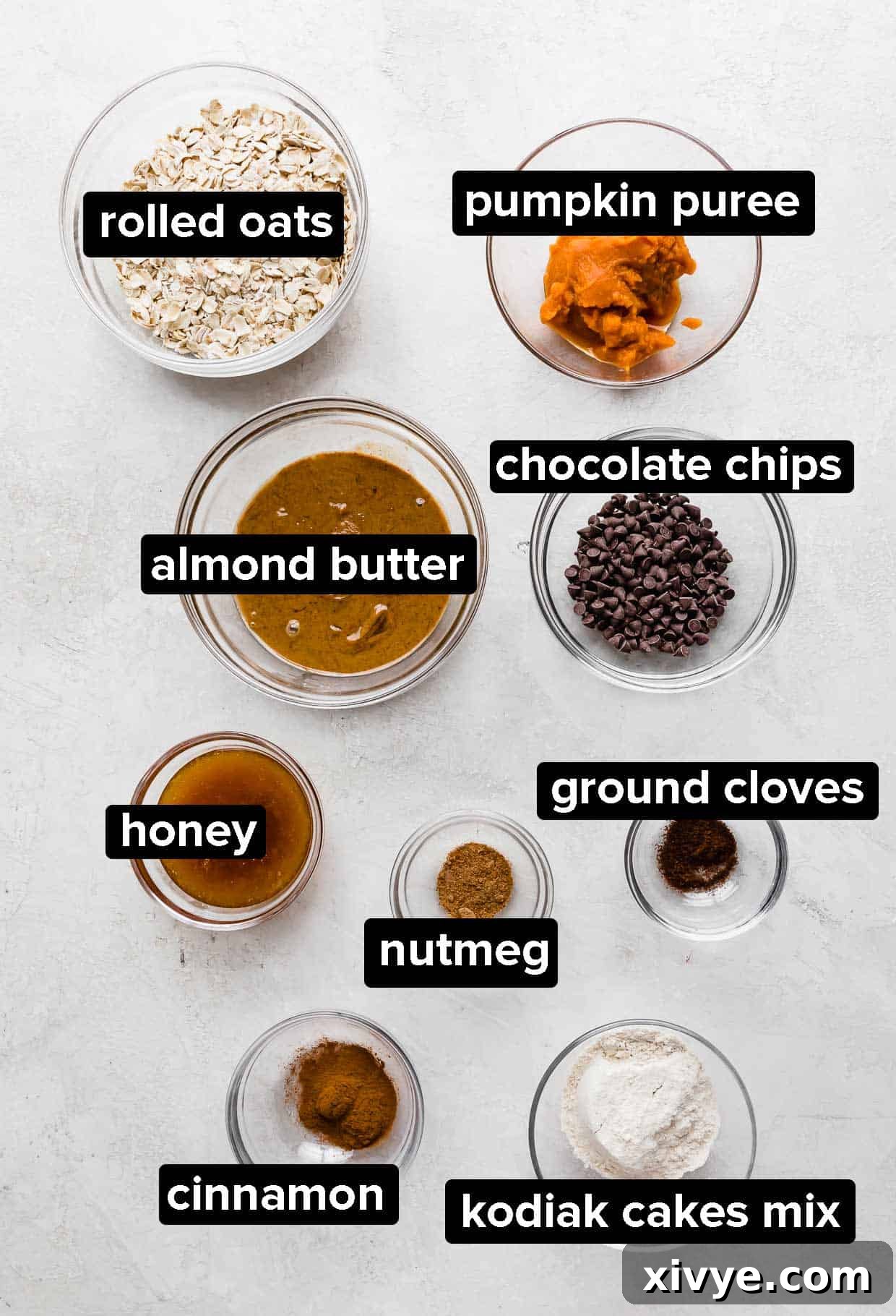 A vibrant selection of ingredients laid out, ready to be combined for the pumpkin energy balls.