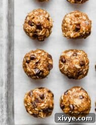 A close-up image of the finished pumpkin energy balls, stacked and ready to eat.