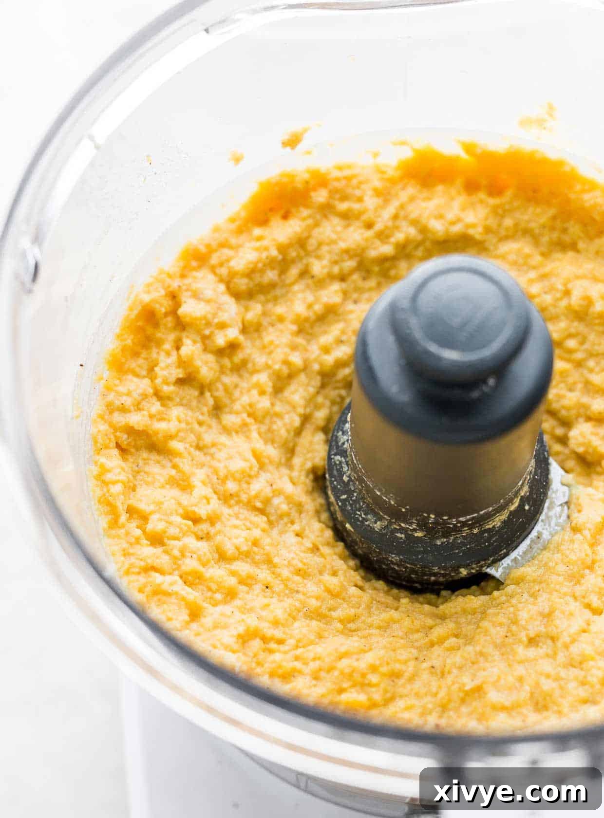 Creamy Butternut Squash Ravioli filling pureed in a food processor.