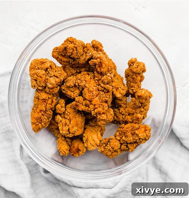 The Fingerprint Wingery 5 A bowl of fried chicken strips.