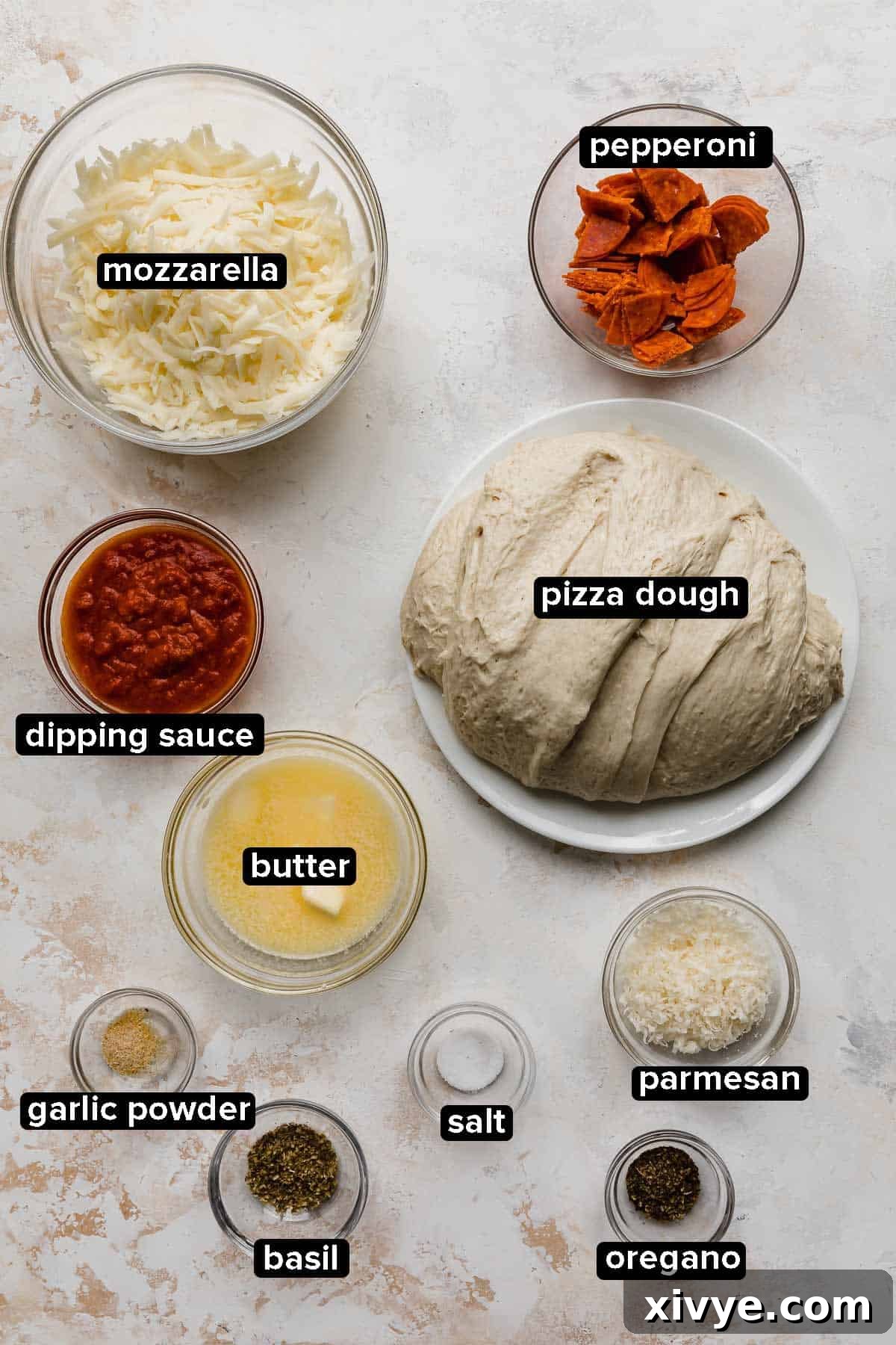 Pizza Rolls ingredients on a white textured background. 
