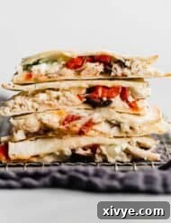 Cut Greek Quesadillas against a white background.