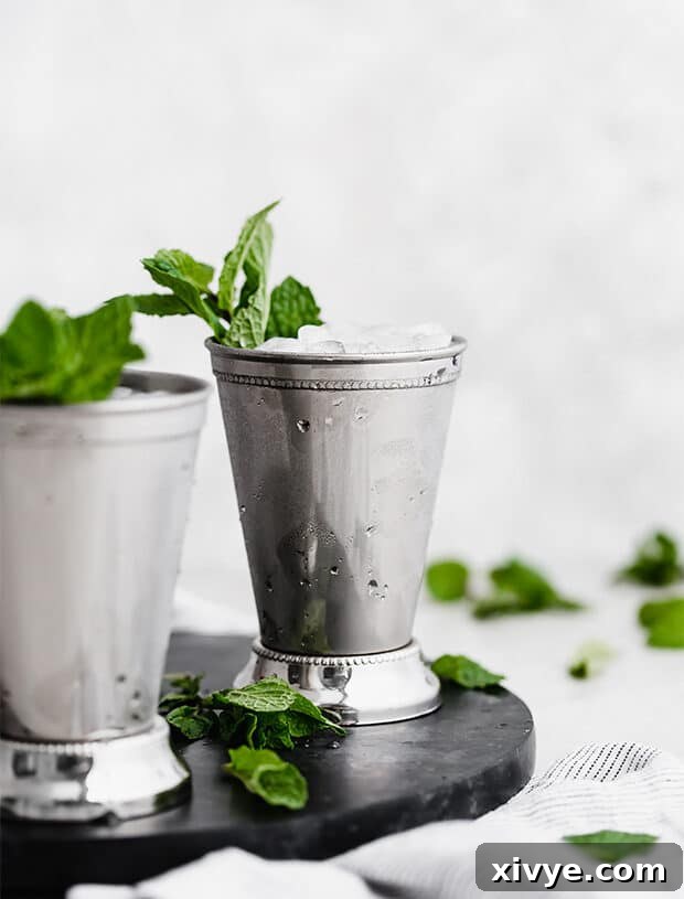 Zero-Proof Mint Julep 3 A straight on photo of a mint julep in a silver cup.