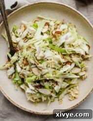 Crunchy Cabbage Salad on a tan plate.