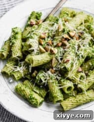 Rigatoni noodles tossed in vibrant kale pesto, garnished with chopped pistachios and parmesan cheese.