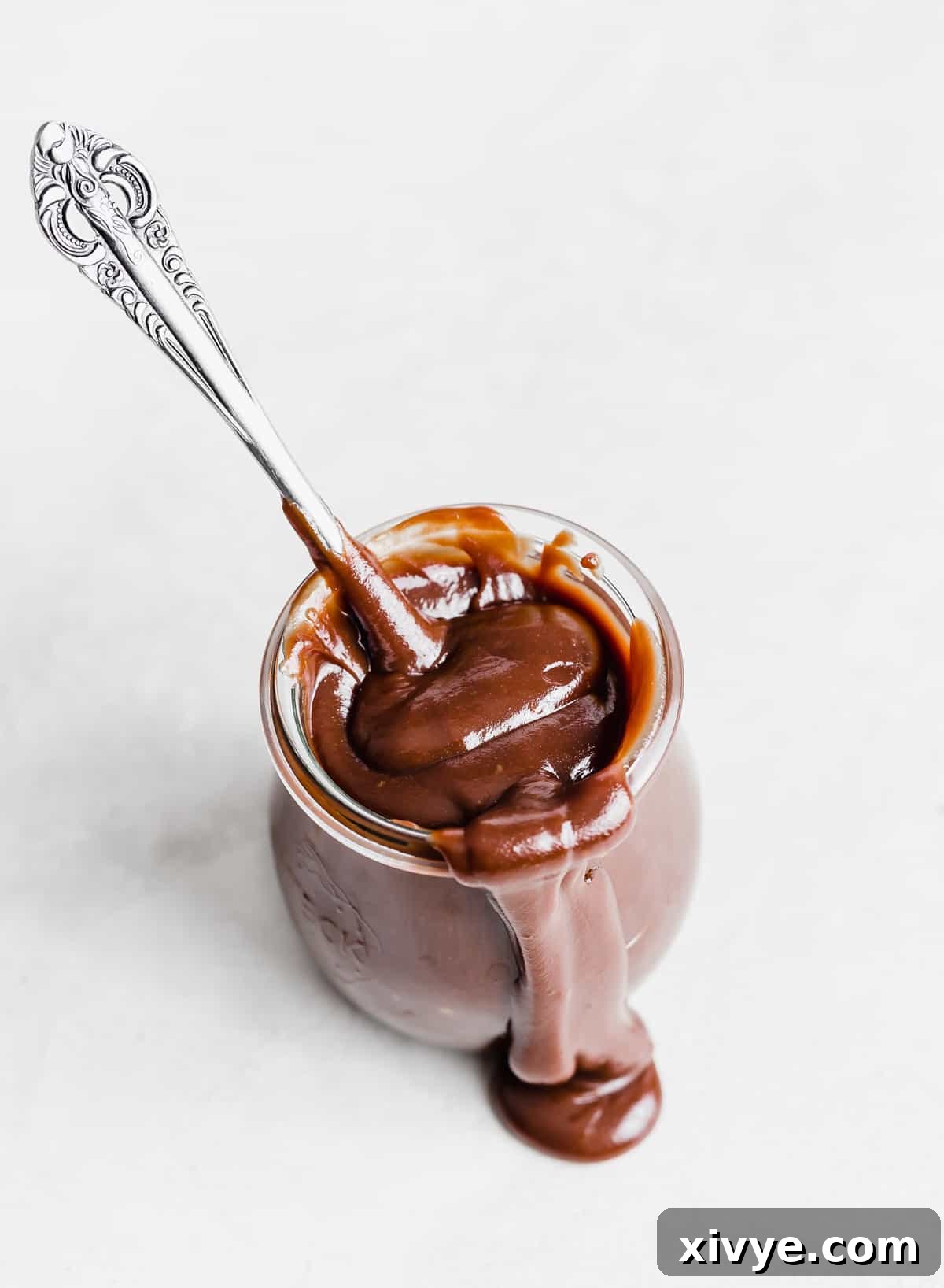 Classic Hot Fudge Sauce 11 Old fashioned Hot Fudge Sauce in a glass jar on a white background.