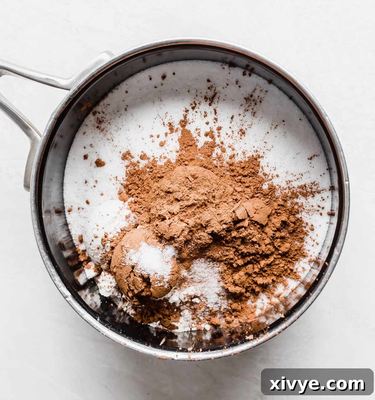 Classic Hot Fudge Sauce 4 A saucepan with sugar, flour, cocoa powder and salt in it.