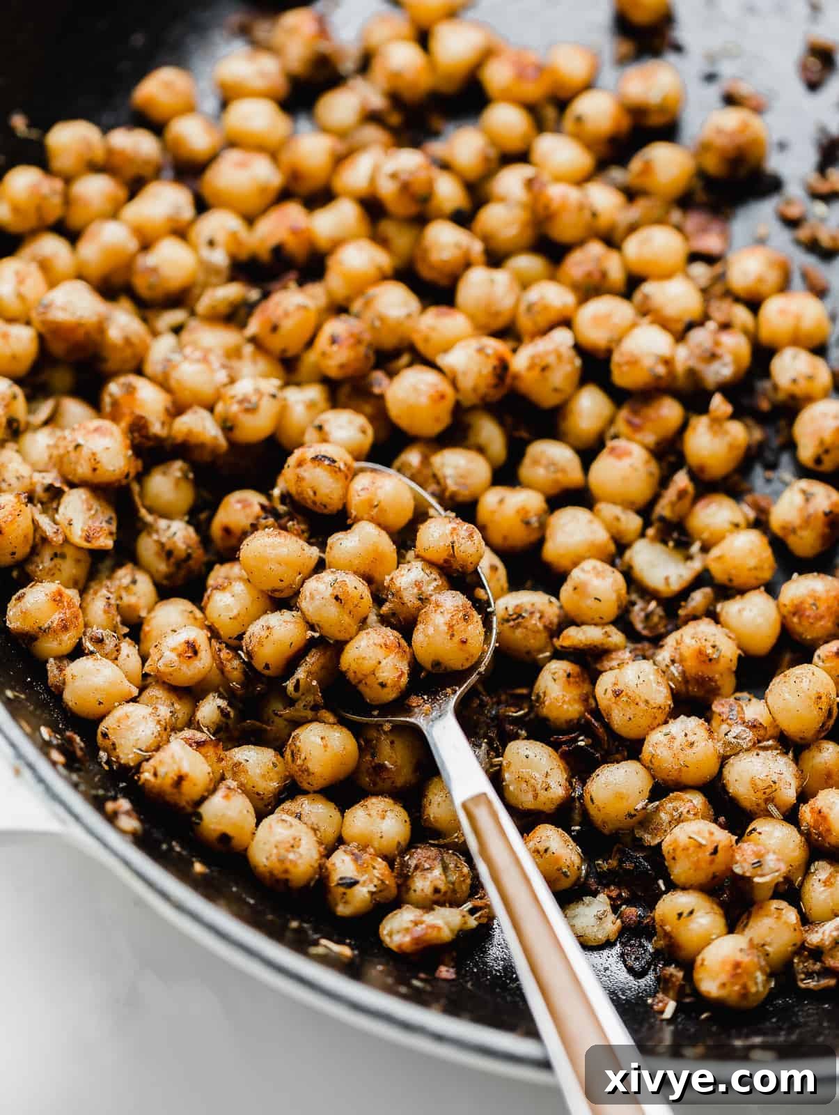 Mediterranean Chickpea Gyros 4 Crispy chickpeas in a skillet.