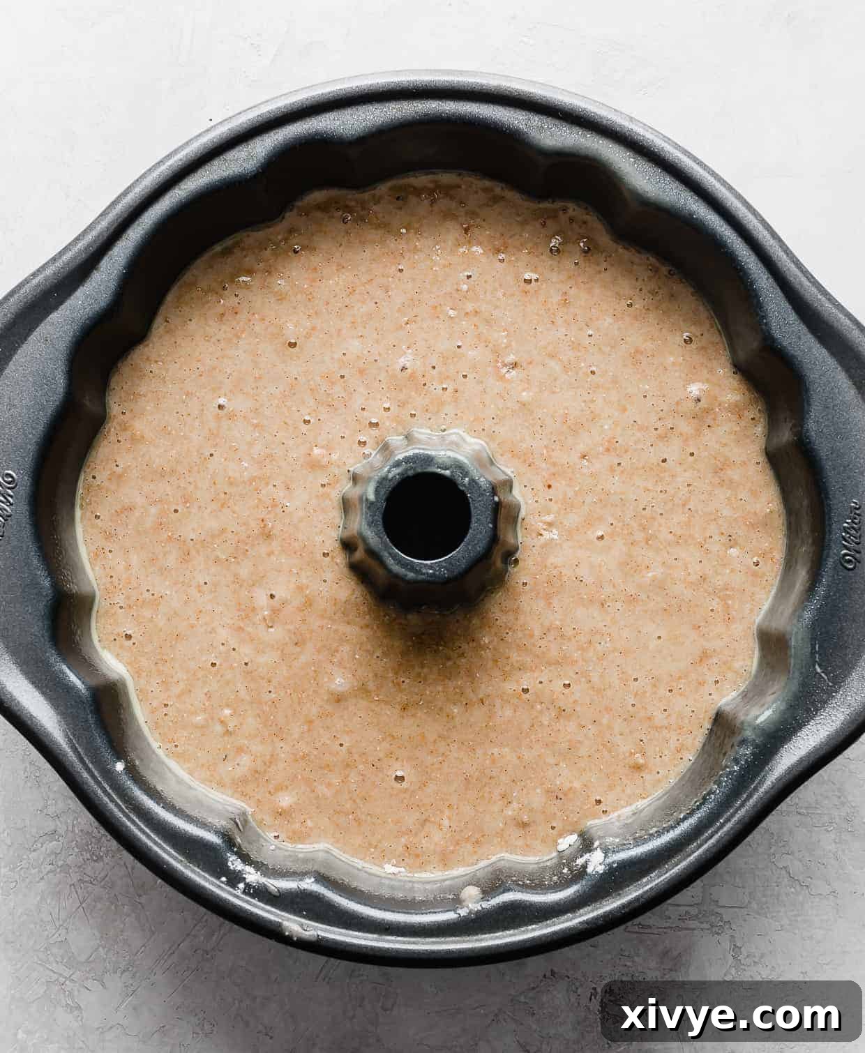 A Bundt Cake full of cake batter.