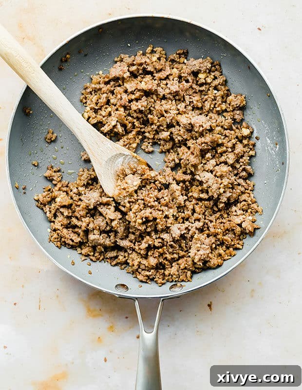 Classic Country Sausage Gravy 3 A skillet full of cooked pork sausage, ready for the next step.