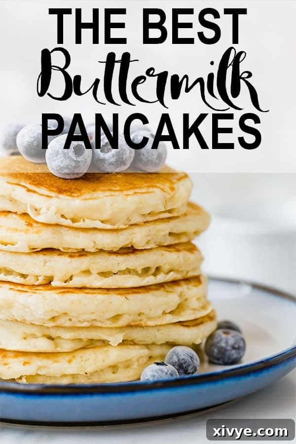 A vibrant image of Homemade Buttermilk Pancakes that are thick and incredibly fluffy! Imagine drizzling rich maple syrup over the top for the perfect breakfast experience! #pancakes #buttermilkpancakes #breakfast #fluffypancakes #syrup