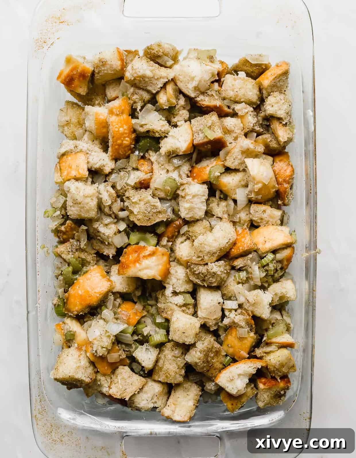 The Ultimate Thanksgiving Stuffing 7 Homemade Thanksgiving Stuffing in a 13x9 inch baking dish.