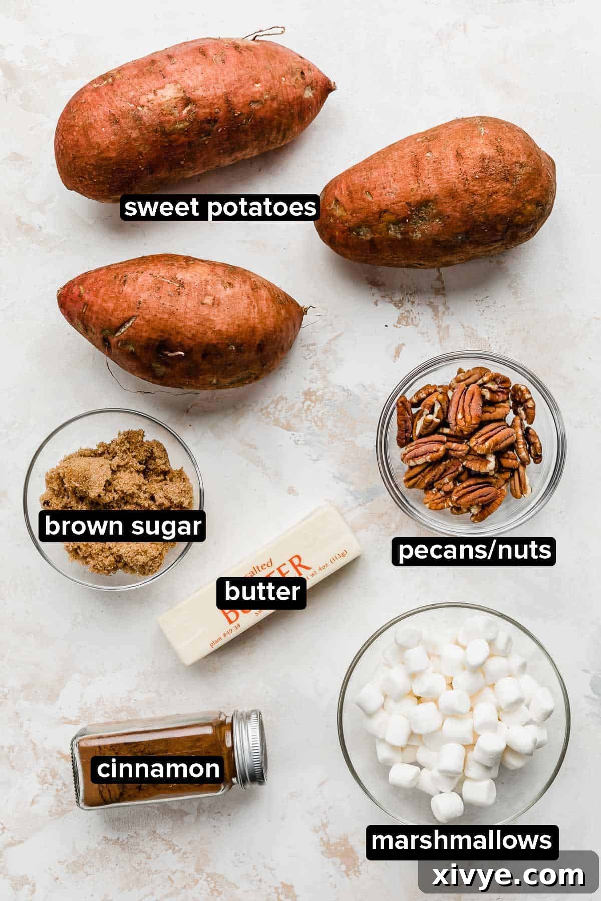 Golden Baked Sweetness 3 Baked Sweet Potato ingredients and sweet potato topping ideas on a white background: marshmallows, cinnamon, butter, nuts, brown sugar.