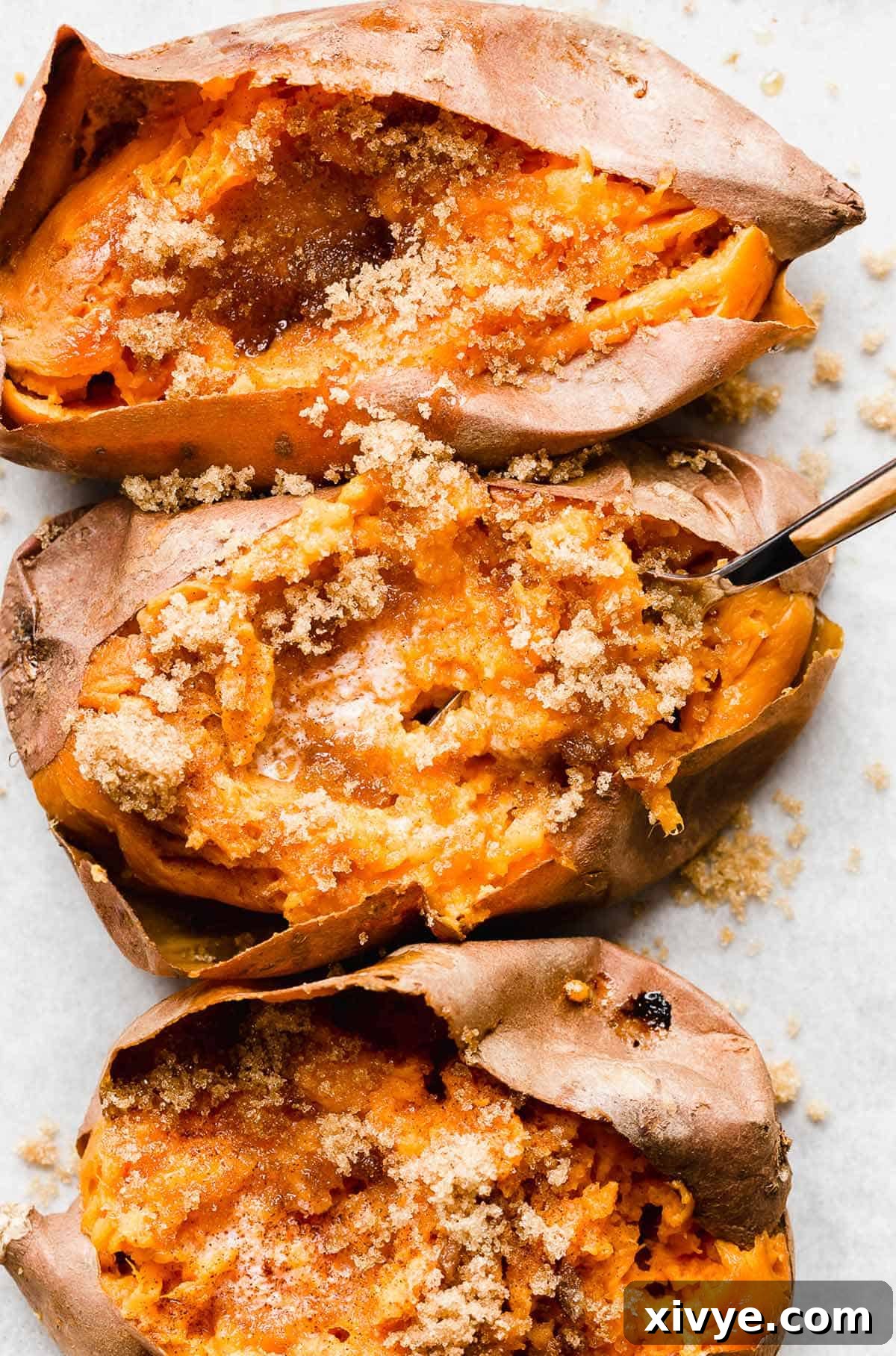 Golden Baked Sweetness 7 Baked Sweet Potato topped with brown sugar and butter.