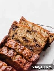 Slices of Chocolate Chip Banana Bread against a white background.