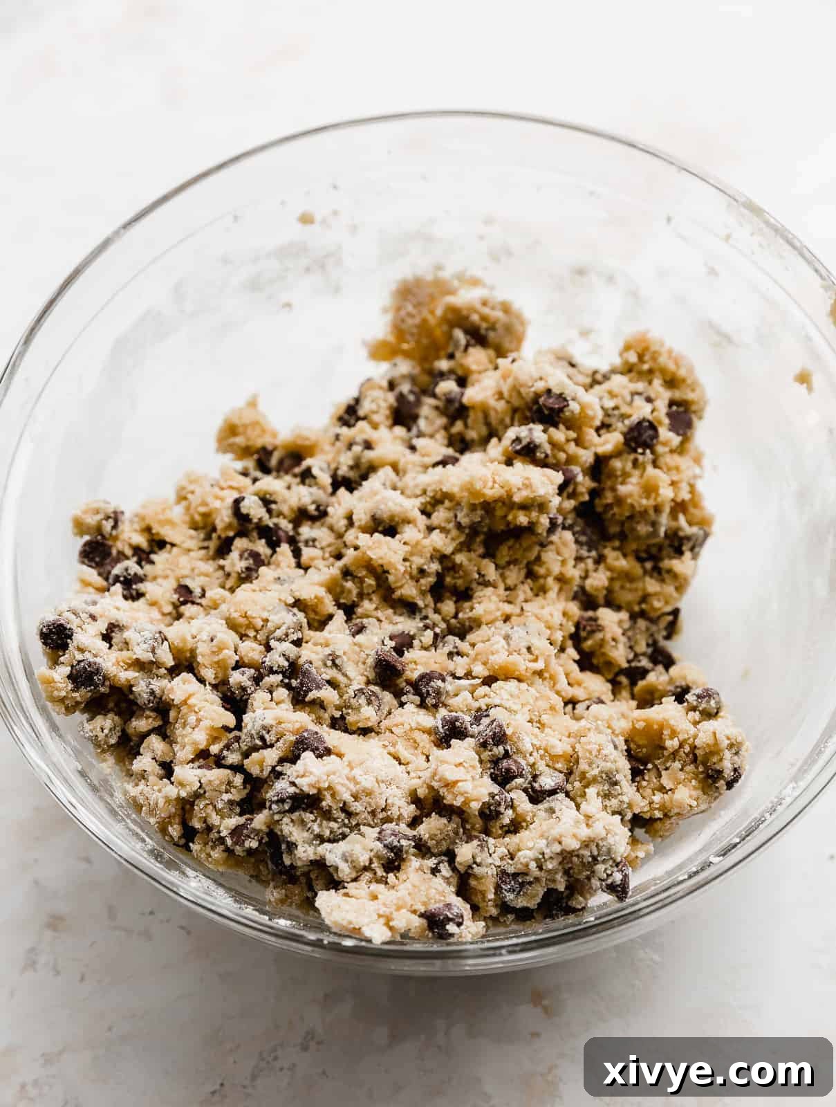 Chocolate Chip Cookie dough in a glass bowl.