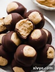 A homemade Buckeyes ball with a bite taken out of it.