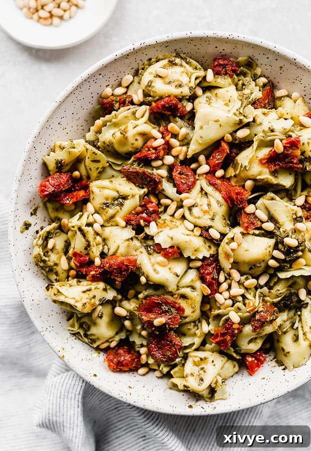 Strategic Eating: Week 2 6 Pesto tortellini topped with sun dried tomatoes and pine nuts, a quick and delicious meal.