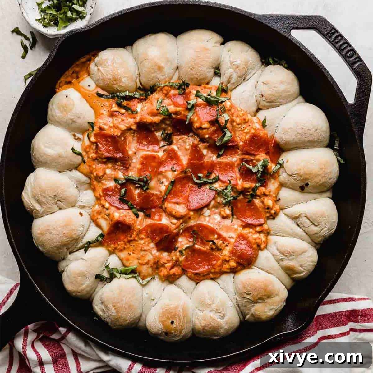 A Pepperoni Pizza Dip in a skillet.