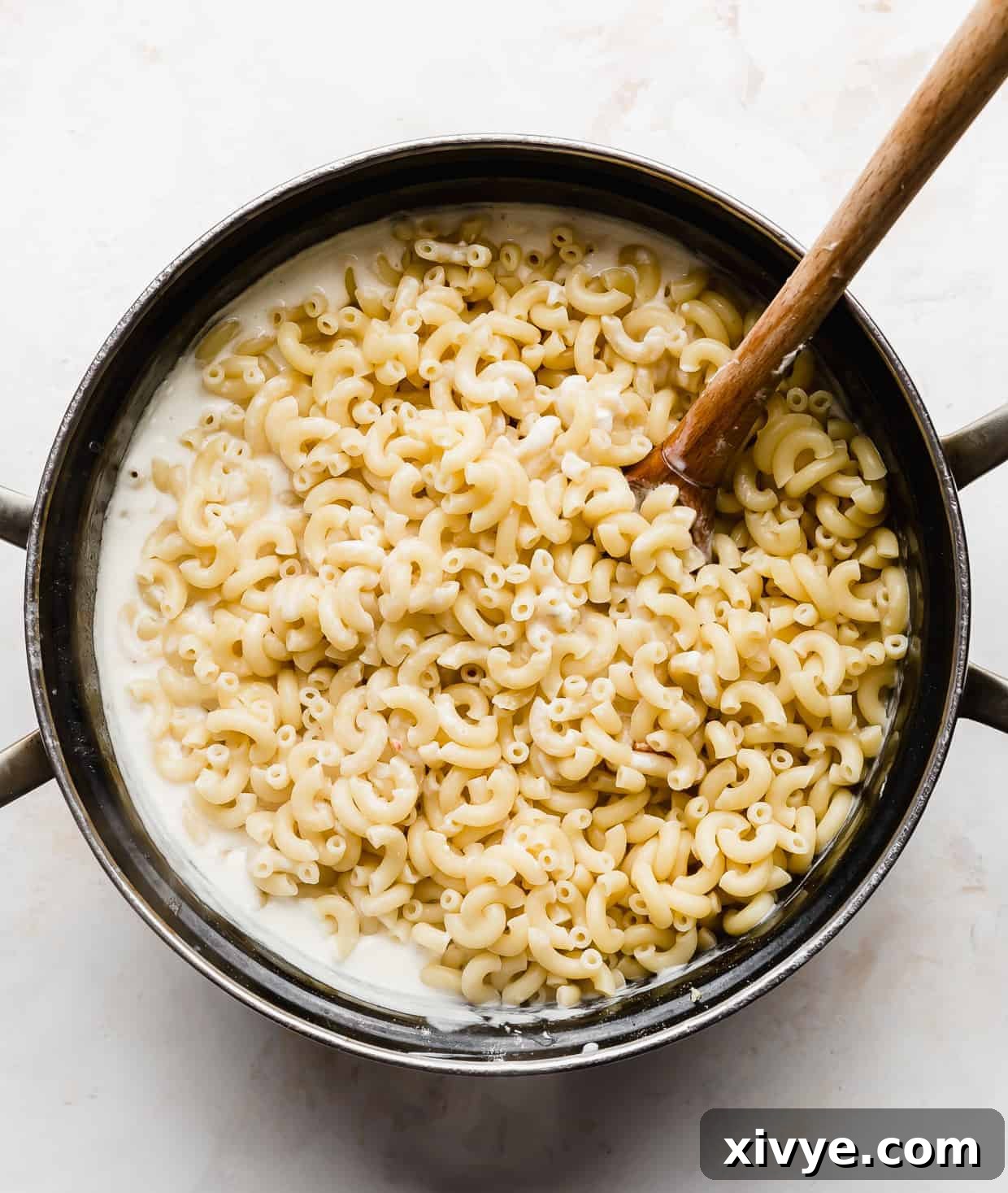 Spicy Pepper Jack Macaroni 5 Cooked macaroni noodles in a large pot.